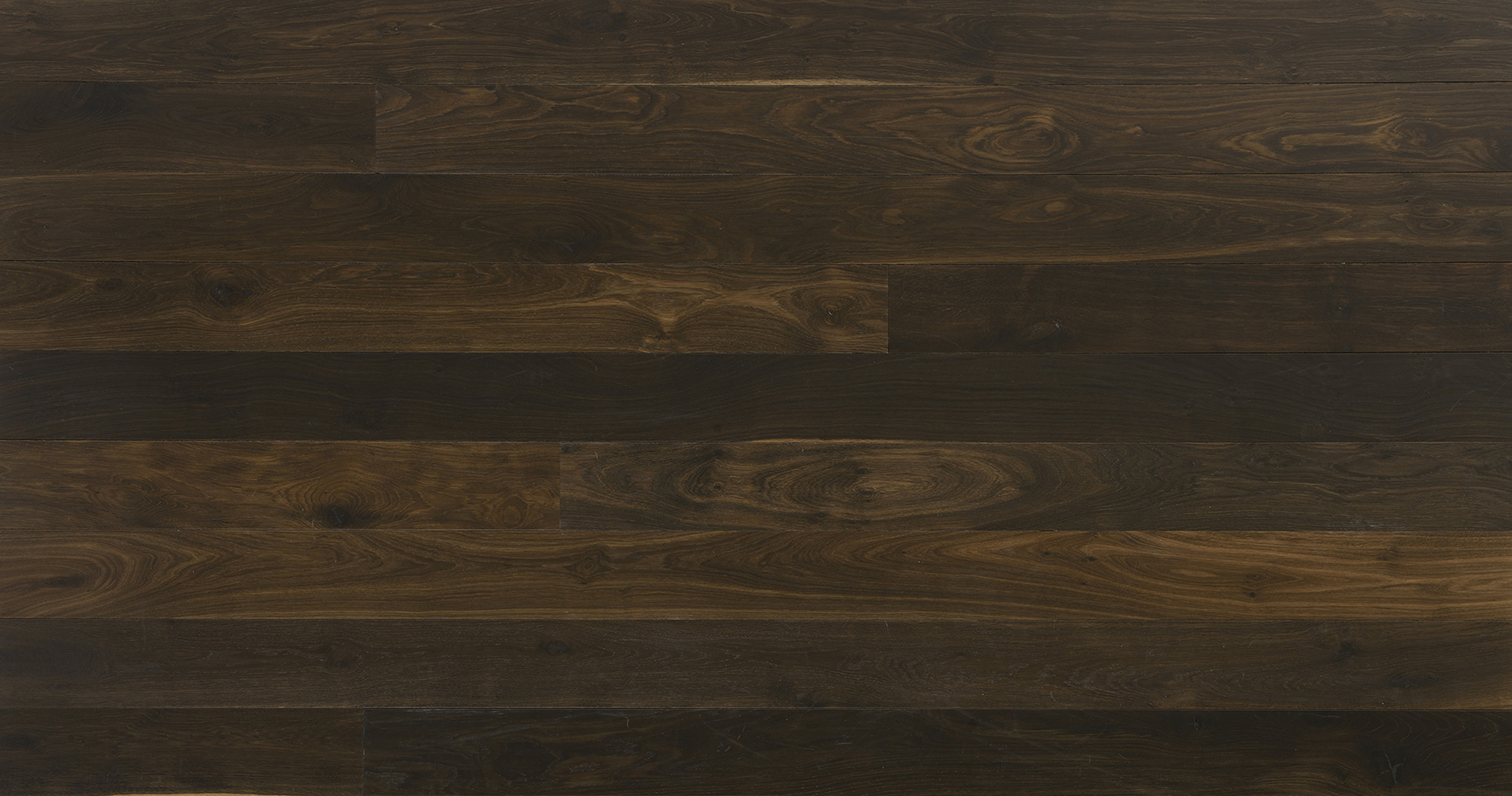 Files_Images_WOODEN-FLOORING_PLANK-HARDWOOD-FLOORING_GRADINGS_BLACK-OAK_Junckers-plank-Black-Oak-Harmony